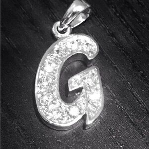 Letter “G” silver plated and zirconia charm!